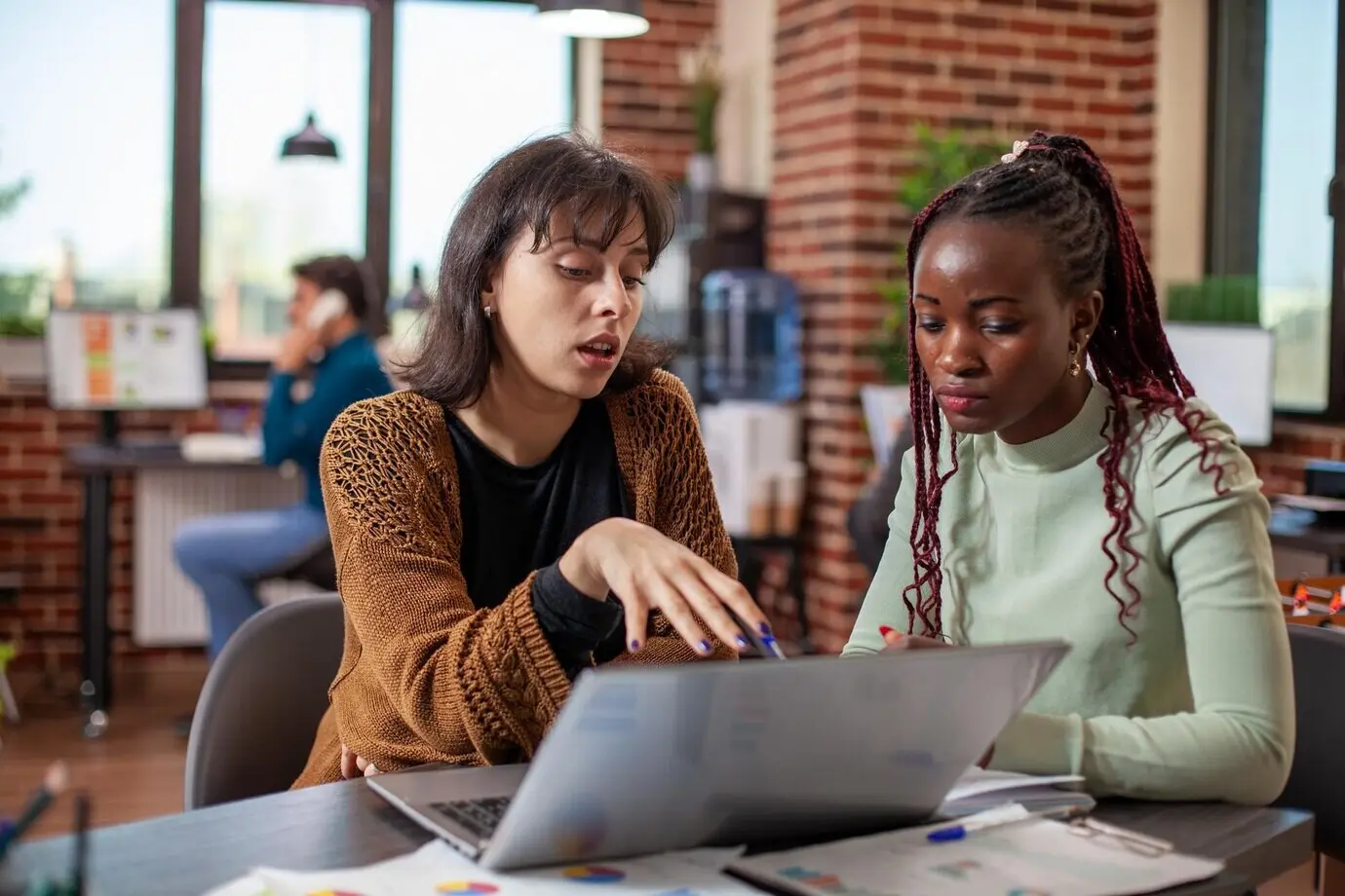 Business partners discuss ideas for strategy.