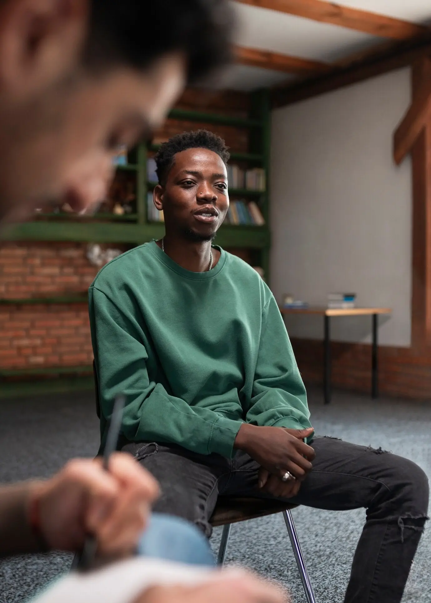 People attending a support group meeting