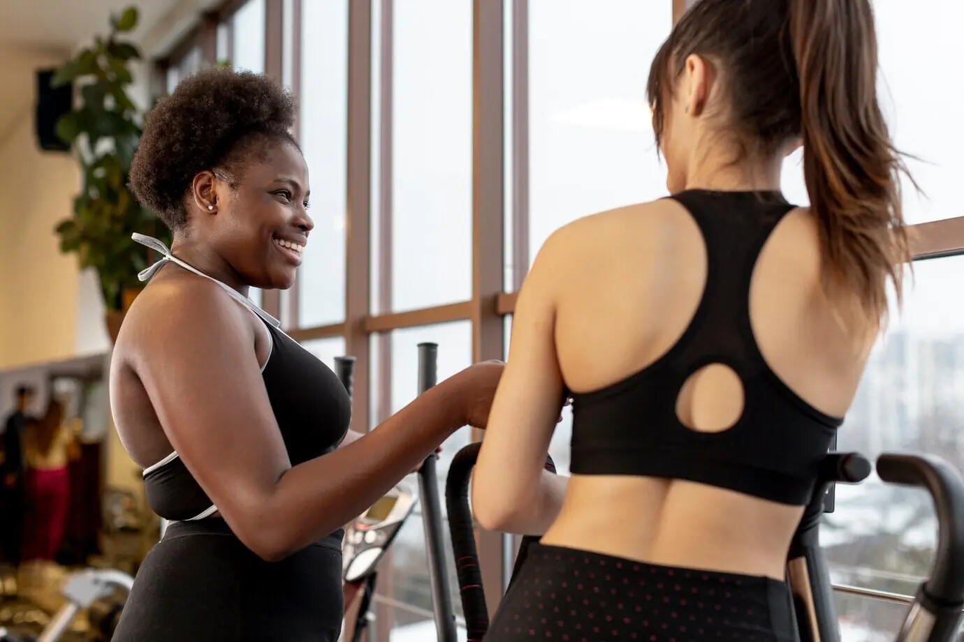 Young females working out in a gym.